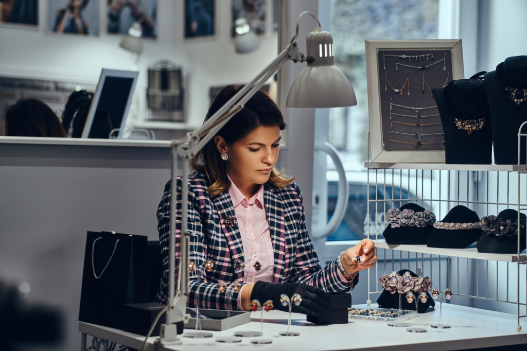 Woman seller in a luxury jewelry store.